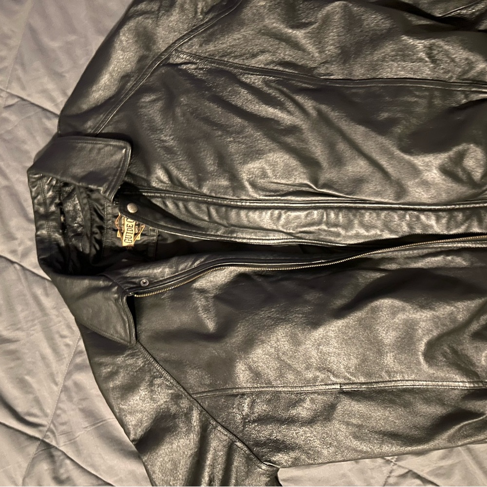 Sleek Black leather Jacket with Glossy Finish